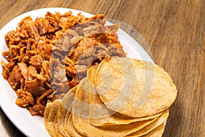 Pastor meat tacos with corn tortillas. Traditional mexican food. Mexican food on wooden background. Mexican taco concept