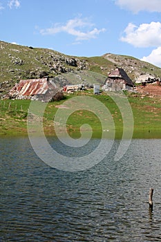 Pastoral village in mountains photo