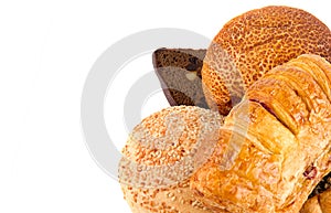 Pastries, buns and bread Isolated on a white . There is free space for text