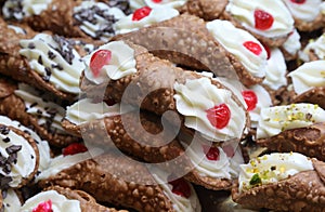 pastries with cherry called SICILIAN CANNOLI which are the typic