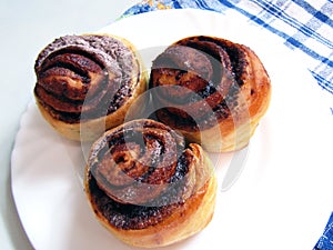 Pastries with cocoa on a white plate