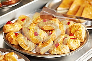 Pastry bun with fruit jam on buffet line