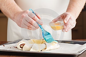 Pastry chef shapes the dough with your hands for cookies