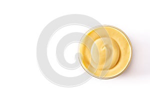 Pastry cream in a bowl isolated on white background photo