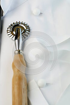 Pastry cutter and chef's uniform