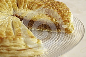 Pastry dough Galette des Rois with cream frangipane with almond