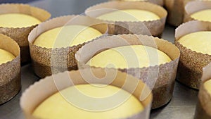 Pastry easter sweet bread cakes on worktop, panning