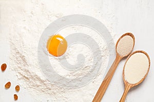 Pastry ingredients. Egg, flour and yeast on white
