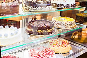 Pastry shop in glass cabinet display