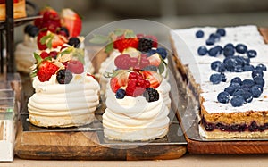 Pastry shop with sweets on display at Prague street food market.