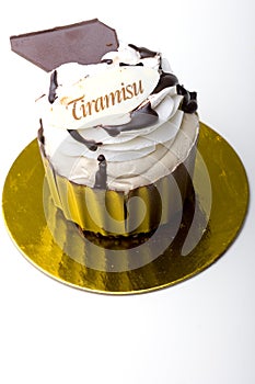 Pastry Tiramisu dessert cake in a chocolate cup