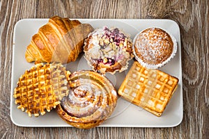 Pastry on wooden background