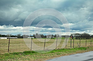 Pasture under Stormy Skies