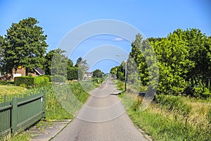 Pastures with farms and roads in the future Fifth Village of the Zuidplaspolder of the municipality of Zuidplas