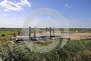 Pastures with farms and roads in the future Fifth Village of the Zuidplaspolder of the municipality of Zuidplas