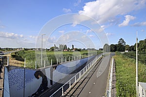 Pastures with farms and roads in the future Fifth Village of the Zuidplaspolder of the municipality of Zuidplas