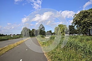 Pastures with farms and roads in the future Fifth Village of the Zuidplaspolder of the municipality of Zuidplas