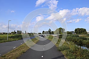 Pastures with farms and roads in the future Fifth Village of the Zuidplaspolder of the municipality of Zuidplas