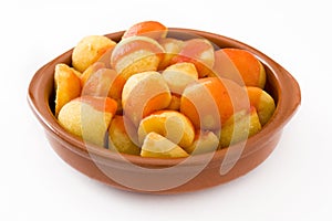 Patatas bravas in bowl isolated