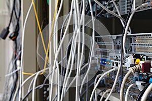 Patch Panel server rack with gray cords in the background