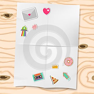 Patches or stickers isolated on white folded paper and wooden background vector illustration. Set of patches with heart