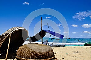 Patching fishing nets on Quy Nhon Beach