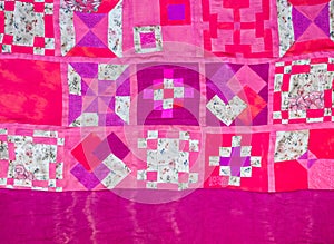 patchwork pink cloth on hand-dyed silk base