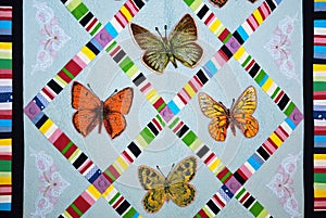 Patchwork quilt with butterflies