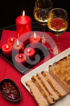 Pate easter dish with wine glasses