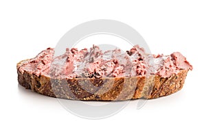 Pate on a slice of bread isolated on white background