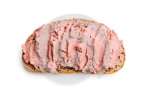 Pate on a slice of bread isolated on white background