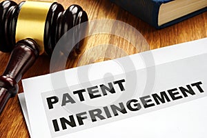 Patent infringement and gavel. Copyright law.