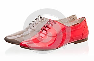 Patent leather women shoes against white