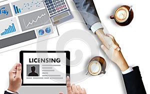 Patent License agreement LICENSING business man hand working o