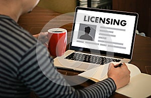 Patent License agreement LICENSING business man hand working o