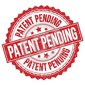 PATENT PENDING text on red round stamp sign