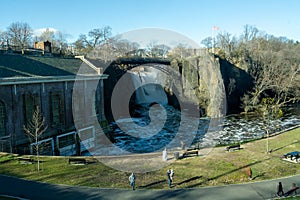 Landscape view of the Great Falls of the Passaic River. A prominent waterfall, 77 feet high, on