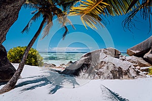 Path along tropical beach on Anse Source d`Argent beach, La Digue Island, Seychelles