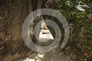 Path between boulders rocks, Anse Lazio.