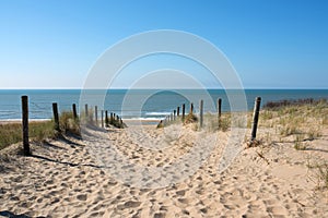 Path in the dunes with sea view