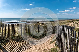 Path in the dunes towards the beach