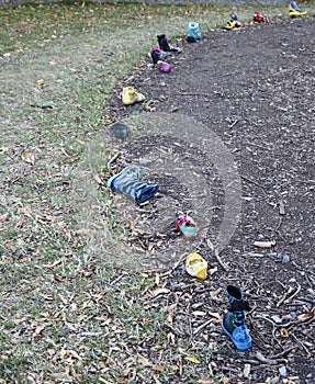 Path in the forest of children`s shoes