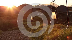 Path with lanterns during sunset