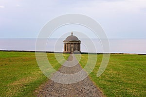 Path leading to Mussenden Temple located near Castlerock in Northern Ireland photo
