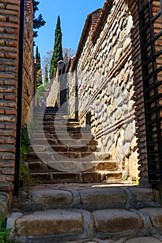 Path leading to St. Nino spring  in a monastery of St. Nino at Bodbe. Sighnaghi, Kakheti, Georgia