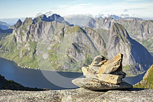 Path marker cairn on way to Munkan peak in Lofotens, Norway