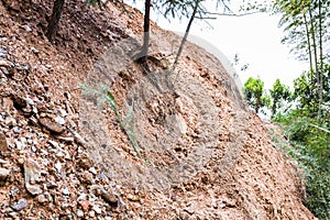 path through mudslide on mountain slope in Dazhai