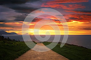 Path near the sea at sunset