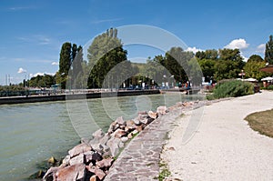 A path next to the landing stage of a ferryboat