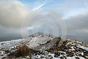 The path over Back Tor Cairn in the snow, Hope Valley, Peak District, Derbyshire